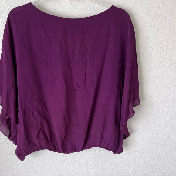 Alice and Olivia purple flutter sleeve silk top size small - Picture 10 of 13